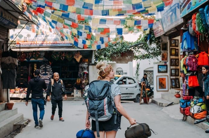 women traveller in a market